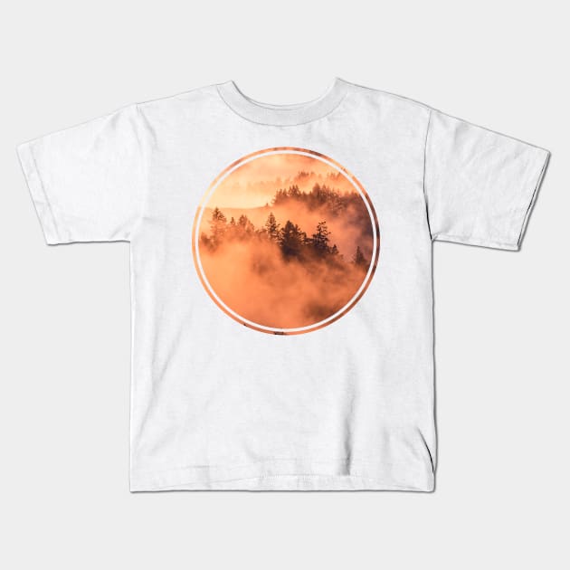 Mysterious Foggy Forest sunrise Kids T-Shirt by Fersan